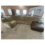 Brown leather power couch with covers