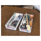 Rubber scrapers, pizza cutter and wooden spoons