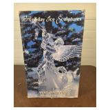 Holiday ice sculpture angle centerpiece