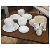 Plates bowls cups mixed dishes