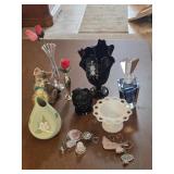 Kitten, vases and an angel