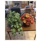Basket of flowers and fake plant