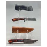 Two Custom Fixed Blade Knives with Layered Handles and Leather Sheaths