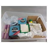 Gardening Supplies Including Plant Food, Bone Meal, and Landscaping Fabric in Storage Tote