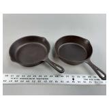 Two Cast Iron Skillets Including Puritan No. 5