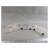 Three Plano Plastic Tackle Boxes Containing Fishing Hooks, Jigs, and Blades