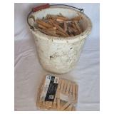 Wooden Clothespins in Ceramic Bucket and Sealed Package