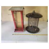 Two Metal Bird Feeders Including House Form and Cylindrical Mesh Form