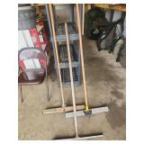 Three Long-Handled Floor Brooms and Scrapers