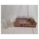 Assorted Glassware Including Patterned Tumblers, Silver Trim Stemware, and Paneled Goblets