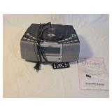 Wedge Model A4116 AM-FM CD Clock Radio with Remote and Manual