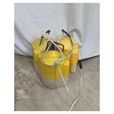 Three Yellow Submersible Utility Pumps with Ropes and Power Cords