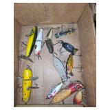Group of Wooden and Metal Fishing Lures with Various Finishes and Hardware