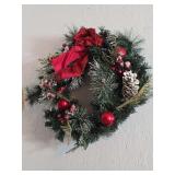 Artificial Holiday Wreath with Pine Cones, Red Ornaments, and Bow