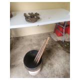 Metal Pitching Horseshoes and Stakes in Bucket