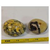 Two Polished Stone Eggs with Natural Mineral Inclusions