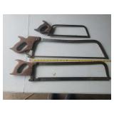 Three Metal Hand Saws with Wooden Handles