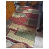 Geometric Pattern Area Rug with Burgundy, Tan, and Green Color Blocks
