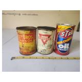 Group of Three Petroliana and Automotive Lubricant Cans including Riley Bros Water Pump Grease, Conoco AceLube, and STP Four Cylinder Oil Treatment