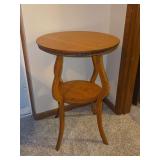 Round Wooden Parlor Table with Lower Shelf and Beaded Trim