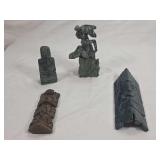 Group of Four Hand-Carved Stone Sculptures Featuring Figural and Mask Motifs