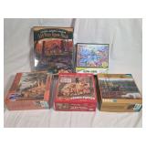 Group of Five Jigsaw Puzzles Including Buffalo Games, White Mountain, and MasterPieces Brands