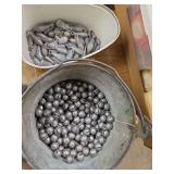 Assorted Lead Fishing Sinkers and Split Shot Weights in Metal Bucket and Plastic Container
