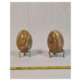 Two Polished Banded Calcite Mineral Eggs with Metal Display Stands
