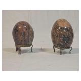 Two Polished Granite Stone Eggs with Metal Display Stands