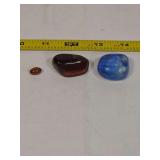 Three Polished Tumbled Stones in Brown, Red-Brown, and Blue with Ultraviolet Light Response