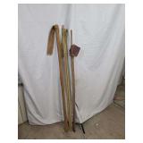 Three Canvas Fishing Rod Sleeves with Wooden Rods