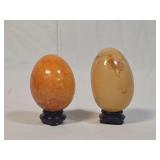 Two Polished Stone Mineral Eggs with Wooden Display Stands