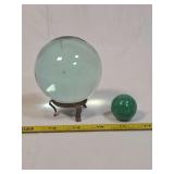 Large Light Blue Glass Sphere on Metal Stand and Small Drilled Green Mineral Sphere