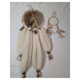 Two Decorative Wall Hangings Featuring Fur Wool Feathers and Beads