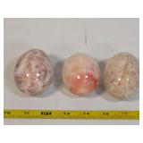 Three Polished Stone Eggs in Pink and White Mineral Varieties