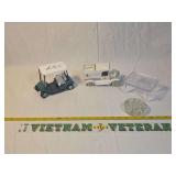 Two Diecast Model Vehicles, Clear Plastic Tabletop Display Stand, and Round Glass Floral Frog