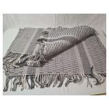 Woven Gray and White Striped Textile Rug with Fringed Edges