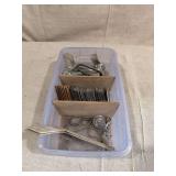 Assorted Hardware, Brackets, and Planter Plates in Plastic Storage Container