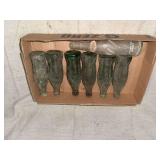 Group of Seven Soda Bottles in Cardboard Tray