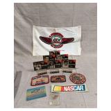 Racing Memorabilia Lot Featuring Castrol GTX Bag, NASCAR Trading Cards, Patches, and Decals