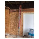 Red and Galvanized Steel Umbrella Clothesline