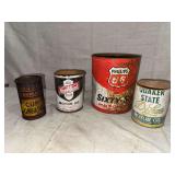 Four Petroleum Product Containers Including Phillips 66, Quaker State, Northland, and Cup Grease Cans