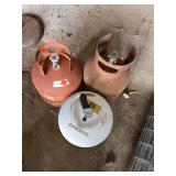 Three Metal Propane Tanks