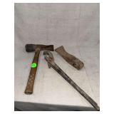 Hand Tools Including Hammer, Pliers, and Axe Head