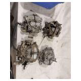 Group of Four Automotive Carburetors
