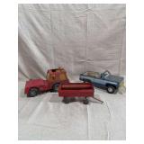 Three Nylint Pressed Steel Toy Vehicles Including Wrecker, Pickup Truck, and Trailer