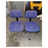 Two Blue Upholstered Office Chairs with Metal Bases