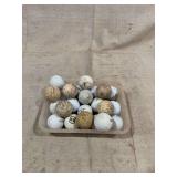 Assorted Golf Balls in Plastic Container
