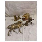 Group of Four Brass Unicorn Figurines and Sculptures