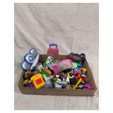 Mixed Toy Lot with Electronic Games, Action Figures, and Accessories